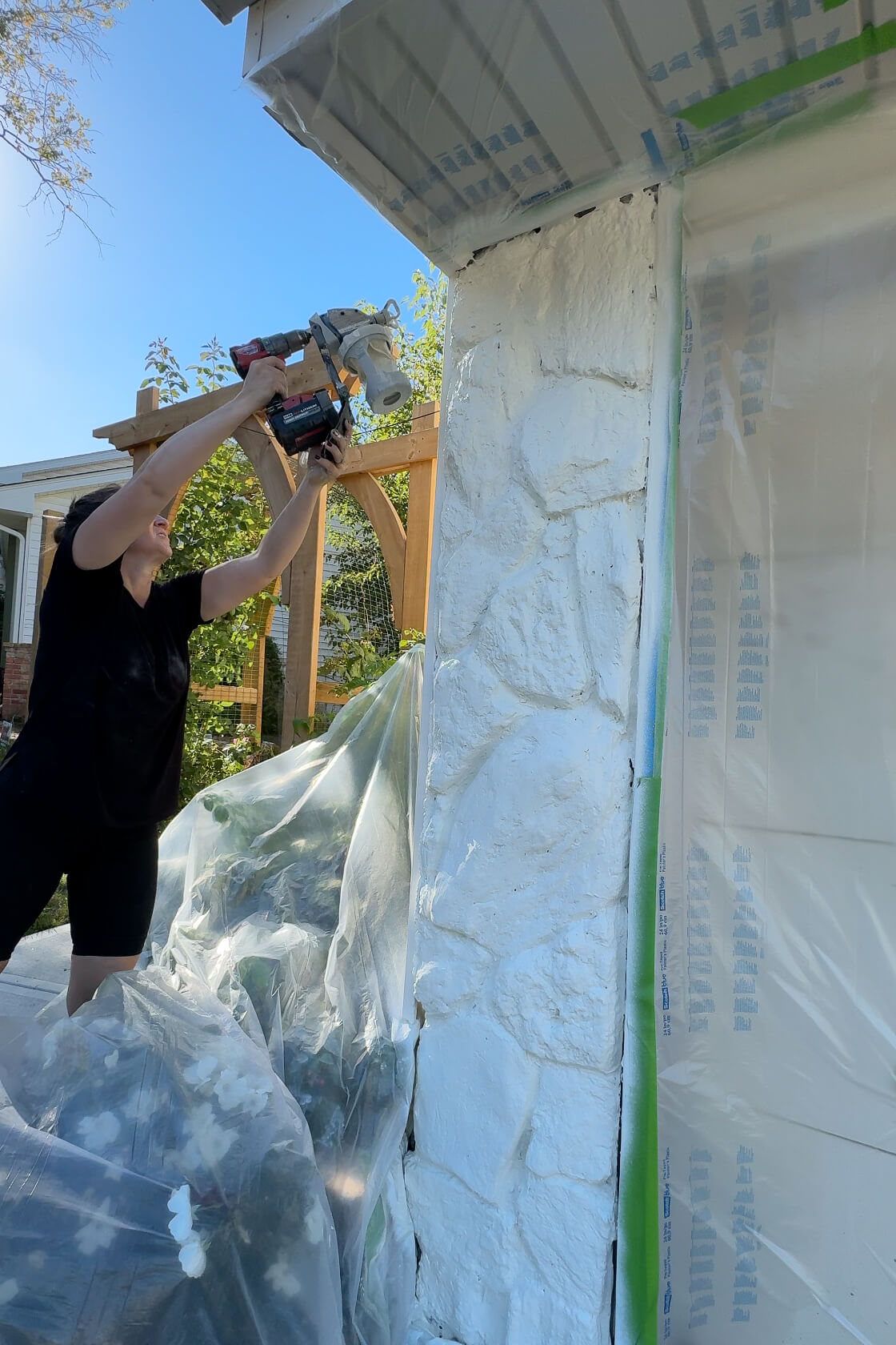 Painting my 1970's rock wall.